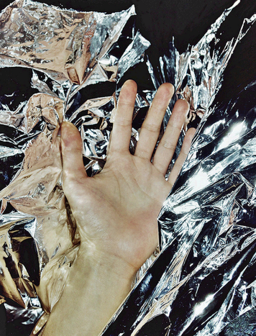 Hand on anti-static foil